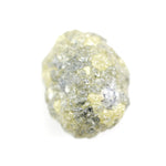 natural yellow diamond in an uncut, irregular form for creating bespoke gold jewelry with a distinctive raw appearance.