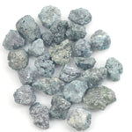 fancy blue rough diamond with a raw uncut diamond for jewelry making