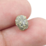 natural yellow diamond in an uncut, irregular form for creating bespoke gold jewelry with a distinctive raw appearance.