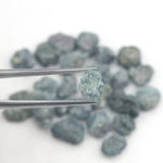 fancy blue rough diamond with a raw uncut diamond for jewelry making
