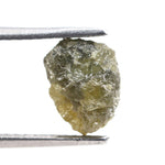 uncut yellow natural diamond with a rugged, irregular surface for designing personalized gold jewelry pieces.