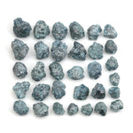 natural blue rough diamond pieces in an uncut loose diamond lot