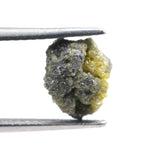 uncut yellow diamond in its natural rough form, suitable for crafting a distinctive custom ring with a unique raw appearance.