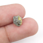 uncut yellow diamond in its natural rough form, suitable for crafting a distinctive custom ring with a unique raw appearance.