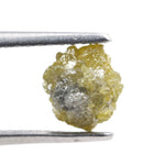 raw yellow natural diamond with an uncut surface, suitable for designing personalized promise rings and meaningful jewelry pieces.