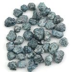 natural blue rough diamond with a raw uncut diamond for jewelry design