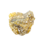 uncut yellow natural diamond with a raw, irregular surface for creating a distinctive anniversary ring or personalized jewelry design.
