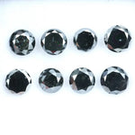 Lot of natural salt and pepper round cut diamonds with dark grey and black inclusions, genuine rustic galaxy diamonds for custom jewelry making, loose natural diamonds arranged on white background.