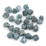 natural blue rough diamond with a raw uncut surface for jewelry design