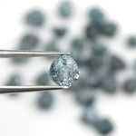 natural blue rough diamond with a raw uncut surface for jewelry design