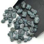 blue natural rough diamond with an irregular raw surface for jewelry making