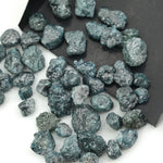 blue natural rough diamond with an irregular raw surface for jewelry making