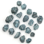 uncut blue raw diamond pieces displayed as a loose rough diamond collection
