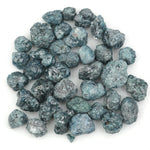 blue natural rough diamond with an uncut raw surface for custom jewelry designs