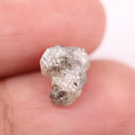 rough cut diamond and rough diamond black showing rough uncut diamonds types of rough diamonds and unpolished rough diamond what do diamonds look like in the rough