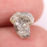rough cut diamond and rough diamond black showing rough uncut diamonds types of rough diamonds and unpolished rough diamond what do diamonds look like in the rough