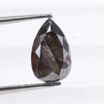 1.31 Ct pear cut black natural diamond loose stone with deep rich color and brilliance for engagement rings and custom jewelry.