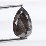 1.31 Ct pear cut black natural diamond loose stone with deep rich color and brilliance for engagement rings and custom jewelry.