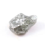 unpolished diamond showing what does a diamond in the rough look like and what does a real diamond look like with natural cut diamond and natural diamond chain details