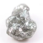 unpolished diamond showing what does a diamond in the rough look like and what does a real diamond look like with natural cut diamond and natural diamond chain details