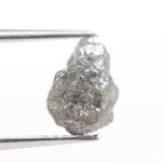 unpolished diamond showing what does a diamond in the rough look like and what does a real diamond look like with natural cut diamond and natural diamond chain details