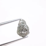 unpolished diamond showing what does a diamond in the rough look like and what does a real diamond look like with natural cut diamond and natural diamond chain details