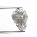 unpolished diamond showing what does a diamond in the rough look like and what does a real diamond look like with natural cut diamond and natural diamond chain details