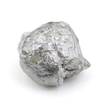 raw rough diamond gemstone showcasing its original natural formation.