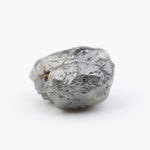 raw rough diamond gemstone showcasing its original natural formation.