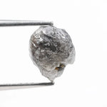 raw rough diamond gemstone showcasing its original natural formation.