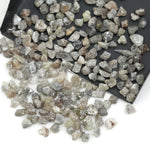 mixed color natural diamond chips showing varied raw uncut shapes for jewelry use