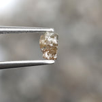 grey raw diamond with an uncut rough surface for jewelry making and custom designs