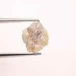 raw uncut diamond crystal showing natural rough diamond appearance yellow grey rough diamond