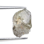Collection of raw gems and loose rough diamonds.