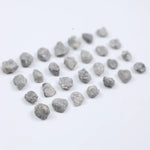 Grey diamond gemstone with natural smoky color and brilliant polish