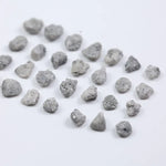 Grey diamond gemstone with natural smoky color and brilliant polish