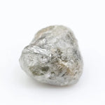 Loose raw diamond stones with natural sparkle.