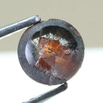 0.78 carat brownish black natural diamond round cut loose stone with subtle dual tone color blend