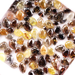Natural fancy color pear shape rose cut diamond lot featuring mixed shades of brown, yellow and champagne loose diamonds, ideal for custom jewelry making, artisan rings, earrings and unique gemstone designs.