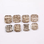 Square cut lab grown diamond with champagne tone and distinctive geometric grid-like inclusions, octagonal step cut, transparent stone for modern sustainable fine jewelry design.