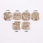 Six octagon step cut lab grown diamonds in fancy light champagne color with natural style inclusions, arranged on white background, ethically created loose stones for custom fine jewelry designs.