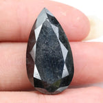 pear cut , grey black natural loose diamond , what does diamond represent in engagement ring symbolism and love