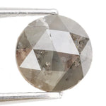 natural round diamond engagement ring and aqua natural diamond grey brown