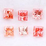 Six square princess cut pink lab grown diamonds in varying shades from light blush to vivid pink, displayed on a white background, featuring brilliant faceting and high clarity for luxury jewelry settings.