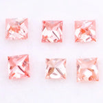 Six square princess cut pink lab grown diamonds in varying shades from light blush to vivid pink, displayed on a white background, featuring brilliant faceting and high clarity for luxury jewelry settings.