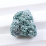 grey color raw uncut diamond engagement ring and raw uncut gems