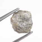 grey color raw uncut diamond engagement ring and raw uncut gems