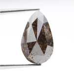 pear cut, brown color, natural loose diamond, in a vintage style rose cut pear shape, perfect for alternative art deco engagement rings.