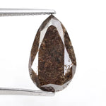 pear cut, brown color, natural loose diamond, in a vintage style rose cut pear shape, perfect for alternative art deco engagement rings.