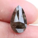 pear cut, brown color, natural loose diamond, in a vintage style rose cut pear shape, perfect for alternative art deco engagement rings.